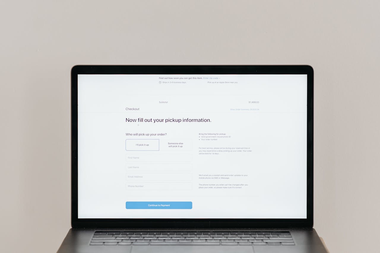 about-01 A laptop displaying an online checkout form, highlighting technology and e-commerce.